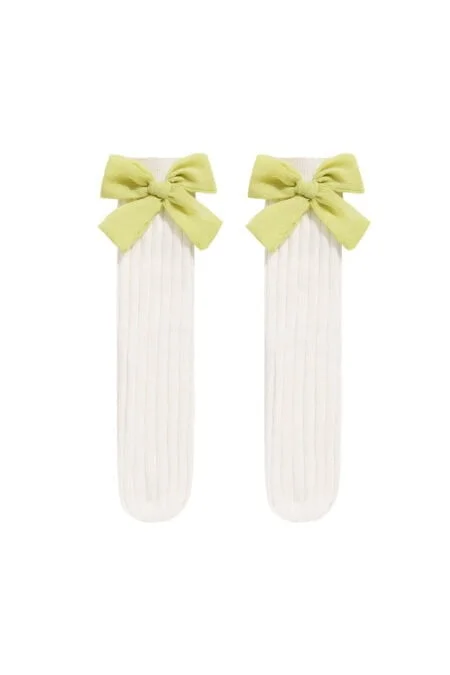 White knee socks for a girl with a bow