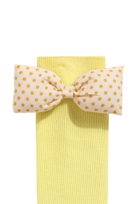 Smooth girls' knee-high socks in yellow with a polka dot bow