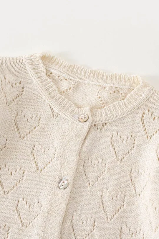 white girly sweater cardiga with hearts detail